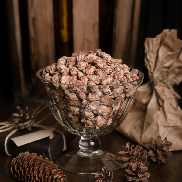 Premium Photo  Chocolate cinnamon nuts and a metal grater on a
