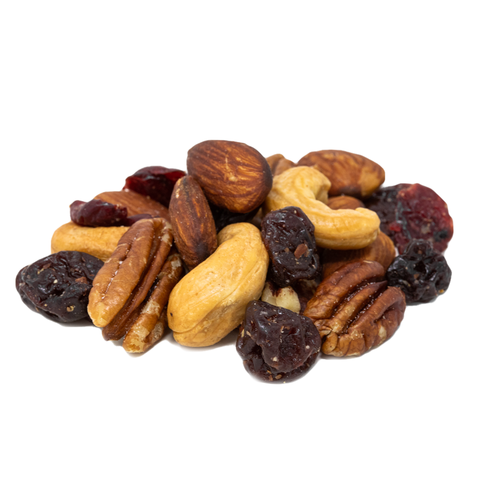 pile of raw almonds, pecans, and cashews with dried Michigan cherries and cranberries